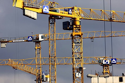 Cranes of company "Hochtief" at a large construction site, Landesarchiv NRW, North Rhine-Westphalia State Archive, Innenhafen harbour, Duisburg, North Rhine-Westphalia, Germany, Europe