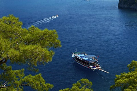 Excursion boats, Blaue Reise boat in Oeluedeniz near Fethiye, Turkish Aegean Coast, Turkey