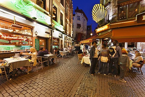 Guests sitting in street restaurants in the old town, Beenhouwersstraat, Brussels, Belgium, Europe