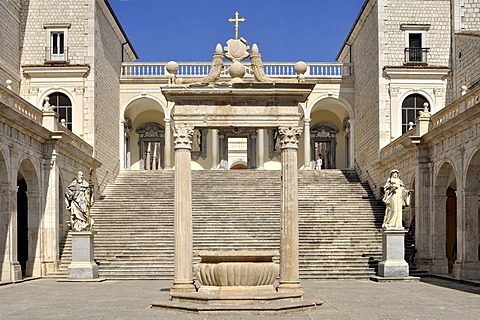 Cistern and statues of St. Benedict and St. Scholastica in the Cloister of Bramante, Benedictine abbey of Montecassino, Monte Cassino, Cassino, Lazio, Italy, Europe