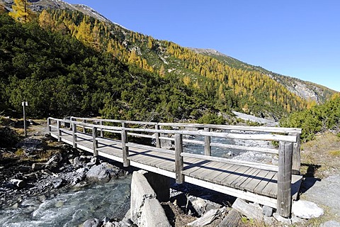 Trail across a wooden bridge, Val Cluozza, Swiss National Park, Engadin, canton of Grisons, Switzerland, Europe