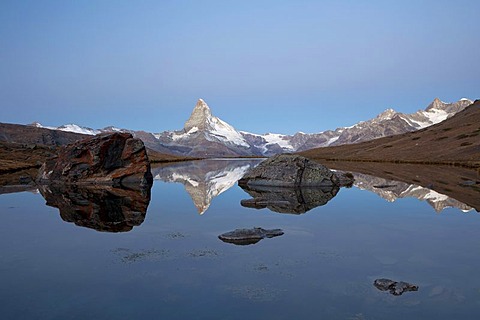 Early morning at Stellisee Lake overlooking Mt Matterhorn, Zermatt, Valais, Swiss Alps, Switzerland, Europe, PublicGround