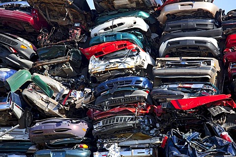 Junk cars crushed and ready for recycling at a scrap yard, Detroit, Michigan, USA