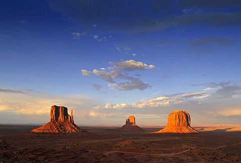 West Mitten Butte, East Mitten Butte and Merrick Butte table mountains in the evening light, Monument Valley, Navajo Tribal Park, Navajo Nation Reservation, Arizona, Utah, United States of America