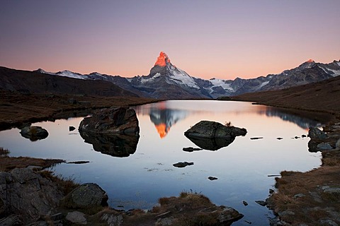 Mt Matterhorn at sunrise, reflection in Stellisee Lake, Zermatt, Canton Valais, Switzerland, Europe, PublicGround