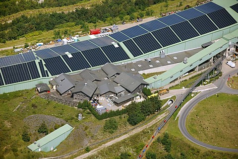 Aerial view, damage caused by sinking of the reclaimed land, Alpincenter Bottrop, with solar panels on the roofs, Bottrop, Ruhr Area, North Rhine-Westphalia, Germany, Europe