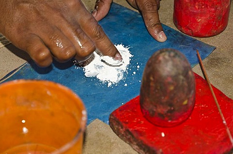 Rice-powder and lime are used as glue for the make-up of the Kathakali dancers, Varkala, Kerala, India, Asia