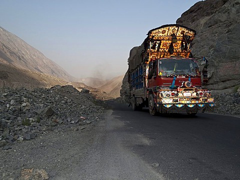 Colourfully decorated truck making its way up the Karakorum Highway, Chillas, North West Frontier, Pakistan, South Asia