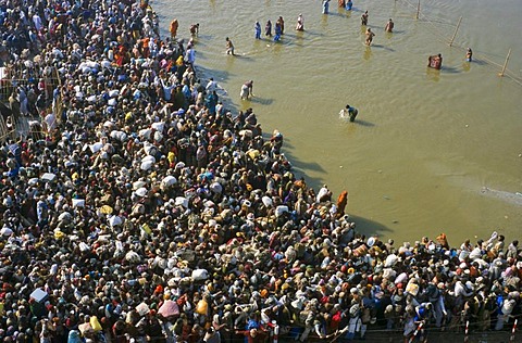 Millions waiting to take Maha Snan, the spiritually cleaning dip in the water at the confluence of the Rivers Ganges, Yamuna and Saraswati in Allahabad, Uttar Pradesh, India, Asia