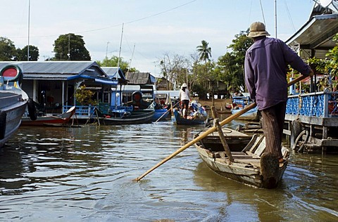 Boat transporting goods across the Tonle Sap River, Kampong Chhnang, Cambodia, Southeast Asia