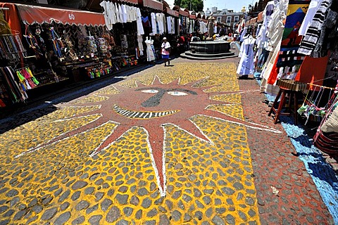 Sun mural on a street with souvenir shops, Puebla, Mexico, Latin America, North America