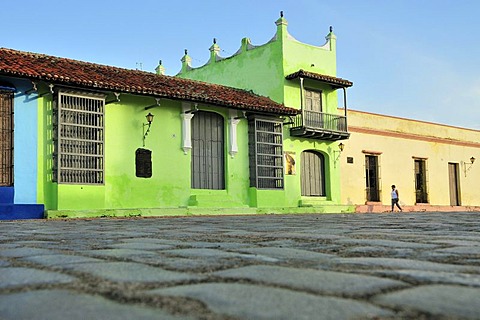 Colourful house facades on Plaza San Juan de Dios square, Camagueey, Cuba, Caribbean