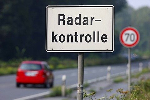 Official sign to warn of a radar control with a TraffiTower speed camera, on the federal road B224, Braukstrasse, in a 70 kilometers per hour speed-limit zone, Bottrop, North Rhine-Westphalia, Germany, Europe