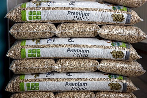 Wood pellets for heating packaged in sacks, at the WestPellets company in Titz, North Rhine-Westphalia, Germany, Europe