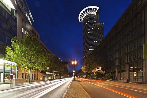 Rush-hour traffic at dusk, Mainzer Landstrasse street, Westendstrasse 1 building at the back, also known as Westend Tower or Kronenhochhaus, DZ Bank headquarters, Frankfurt am Main, Hesse, Germany, Europe, PublicGround