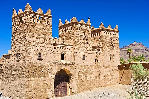 Traditional kasbah, mud fortress, mud brick building of the Berber tribes, Tighremt, with ornaments, Agdz, Draa-Valley, Southern Morocco, Morocco, Africa