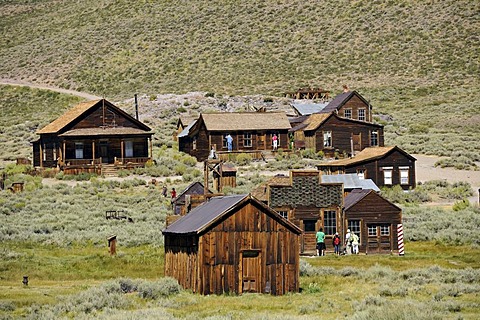 Tourists in the ghost town of Bodie, a former gold mining town, Bodie State Historic Park, California, United States of America, USA