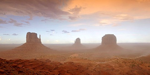 Sand storm before a thunderstorm in the evening light, mesas, West Mitten Butte, East Mitten Butte, Merrick Butte, Scenic Drive, Monument Valley, Navajo Tribal Park, Navajo Nation Reservation, Arizona, Utah, United States of America, USA