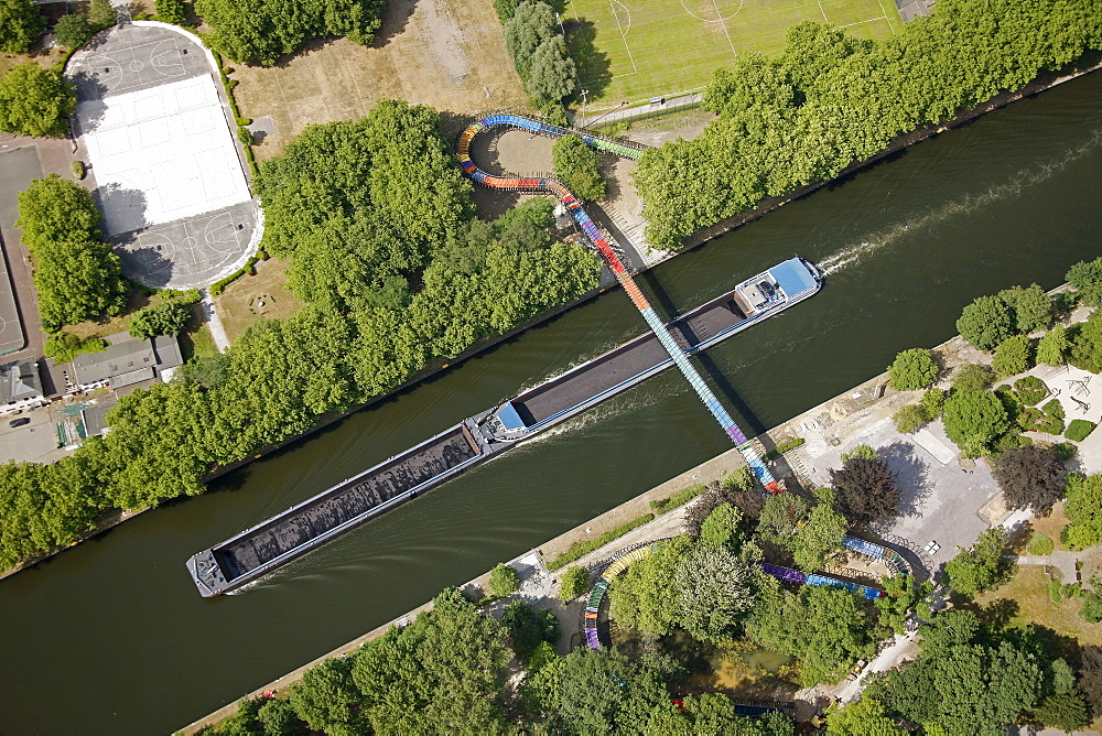 Aerial view, Slinky Springs To Fame, illuminated sculpture by Tobias Rehberger on the pedestrian and bicycle bridge crossing the Rhine-Herne Canal, Oberhausen, Ruhr area, North Rhine-Westphalia, Germany, Europe