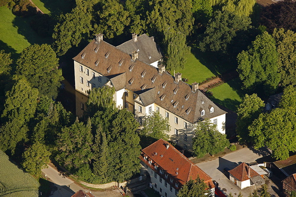 Aerial view, Schloss Wocklum castle, horse riding centre, Maerkischer Kreis region, Sauerland region, North Rhine-Westphalia, Germany, Europe