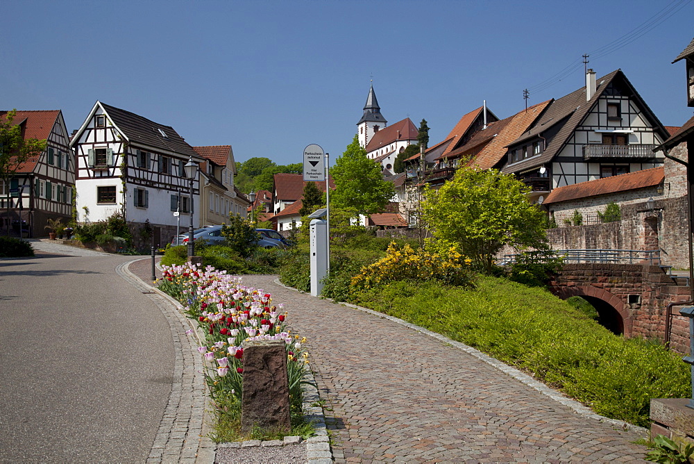 Waldbachstrasse street with the city wall and Liebfrauenkirche Church, Gernsbach climatic spa, Murgtal valley, Black Forest mountain range, Baden-Wuerttemberg, Germany, Europe