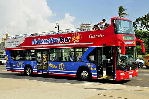 Double-decker bus for sightseeing on the Malecon esplanade, old town Habana Vieja, Havana, Cuba, Caribbean