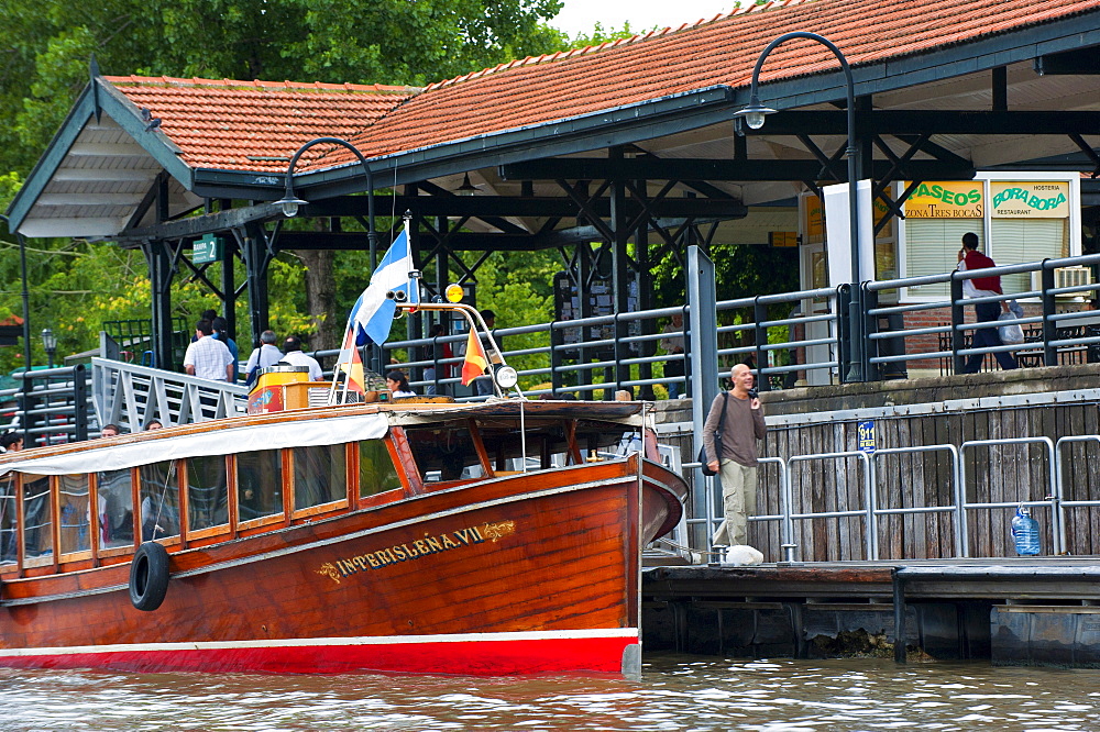 Commercial boat navigating on the Parana delta, Tigre, Buenos Aires, Argentina, South America