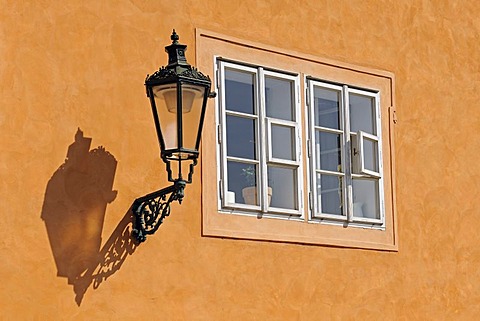 Historic lantern on a wall in Prague, Czech Republic, Europe