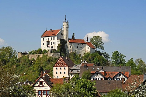 Burg Goessweinstein castle, 1076, remodelled in 1890 in the neo-Gothic, below houses of Goessweinstein, Upper Franconia, Bavaria, Germany, Europe