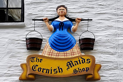 Advertising character above a candy store, Fudgeshop, The Cornish Maids Shop, Polperro, Cornwall, England, United Kingdom, Europe