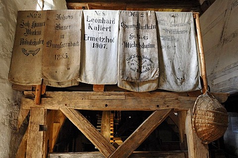 Old linen sacks on the frame of a mill, mill in Unterschlauersbach, 1575, Franconian Open Air Museum, Eisweiherweg 1, Bad Windsheim, Middle Franconia, Bavaria, Germany, Europe