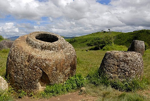 Archeology, ancient large stone jars scattered in the landscape, Plain of Jars, Jar Site 1, Thong Hai Hin, near Phonsavan, province of Xieng Khouang, Laos, Southeast Asia