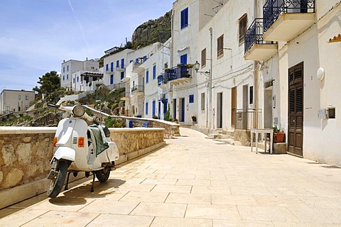 Row of houses with Vespa, Levanzo, Aegadian Islands, Sicily, Italy, Europe