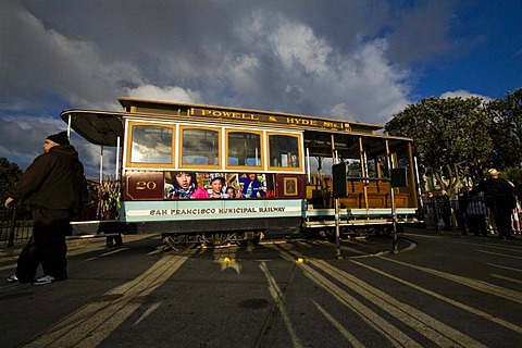 Old cable car of the San Francisco Municipal Railway, Muni, on turntable at final stop, San Francisco, California, USA