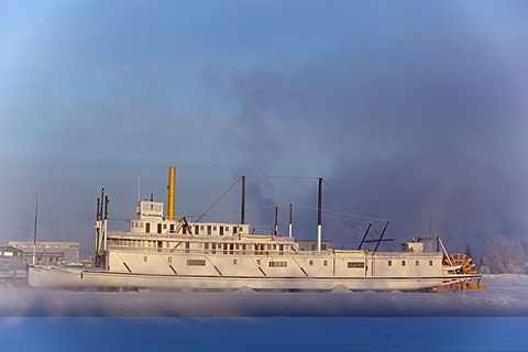 Historic steam ship, stern wheeler, S. S. Klondike, Whitehorse, across the steaming Yukon River, Yukon Territory, Canada