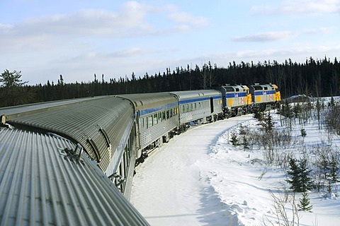 Train moving on the railway line between Winnipeg and Churchill, Manitoba, Canada