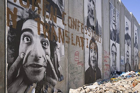 A group of posters on the controversial "security fence", a wall built by the Israelis to separate themselves from the Palestinians, Bethlehem, West Bank, Western Asia