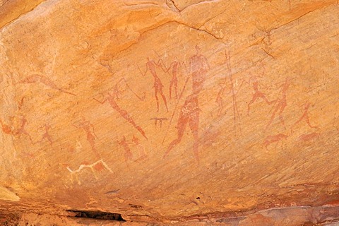 Painted people, neolithic rockart of the Acacus Mountains or Tadrart Acacus range, Tassili n'Ajjer National Park, Unesco World Heritage Site, Algeria, Sahara, North Africa