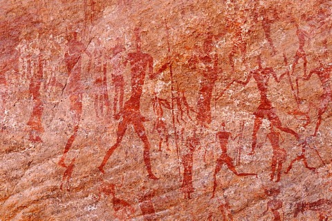 Painted people, neolithic rockart of the Acacus Mountains or Tadrart Acacus range, Tassili n'Ajjer National Park, Unesco World Heritage Site, Algeria, Sahara, North Africa