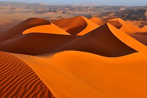 Red sanddune at Tin Merzouga, Acacus Mountains or Tadrart Acacus range, Tassili n'Ajjer National Park, Unesco World Heritage Site, Algeria, Sahara, North Africa