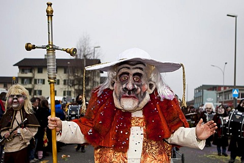 Guggenmusik Huegue-Schraenzer Lucerne music group dressed to the theme of an abbey during the carnival procession, Littau, Lucerne, Switzerland, Europe