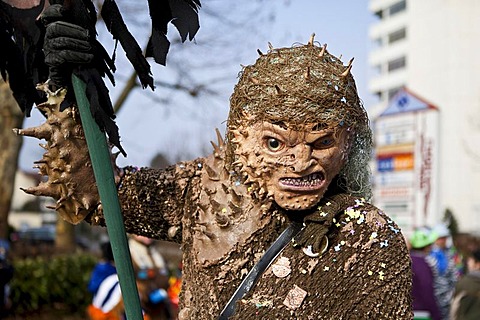 Individual from the Gneckbisser masked group during the carnival procession, Littau, Lucerne, Switzerland, Europe