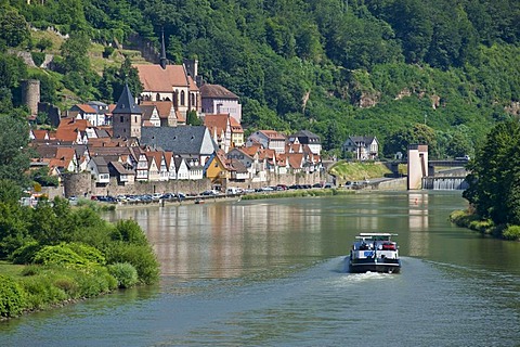 Townscape with the Neckar river and a cargo ship, Hirschhorn, Neckartal Odenwald Nature Park, Hesse, Germany, Europe