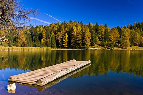 Felix Weiher or Treetsee lake in autumn, Merano region, South Tyrol, Italy, Europe