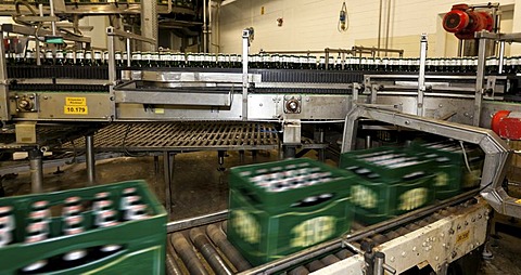 Filled beer crates on a conveyor belt with motion blur, Binding brewery, Frankfurt, Hesse, Germany, Europe