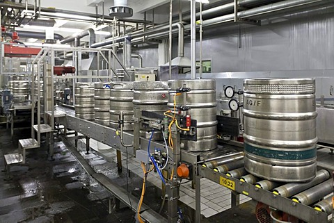 Beer kegs being filled on a conveyor belt, Binding brewery, Frankfurt, Hesse, Germany, Europe