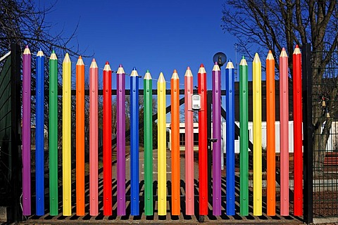 Large coloured pencils forming the gate of the A. Mozart School, Rue de l'Hotel de Ville, Marckolsheim, Alsace, France, Europe