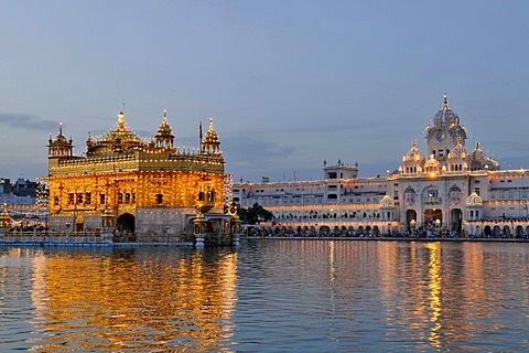 Illuminated and decorated Harmandir Sahib or Golden Temple during the Besaki festival, New Year for Sikhs, Amritsar, Punjab, India, Asia