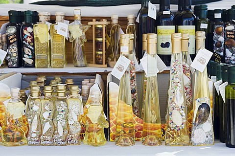 Local specialties and souvenirs on sale at a market stall in the town of Stari Grad, island of Hvar, Dalmatia, Croatia, Europe