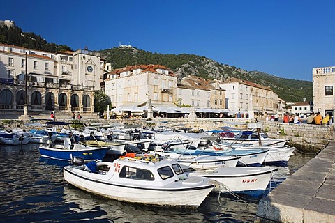 Boats in the harbour, Venetian Loggia, Palace Hotel on St. Stephen's Square, town of Hvar, Hvar Island, Dalmatia, Croatia, Europe